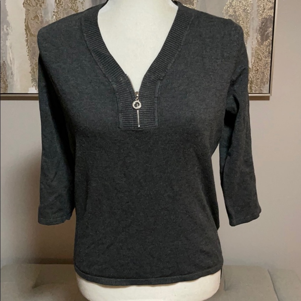 Cable and gauge sweater